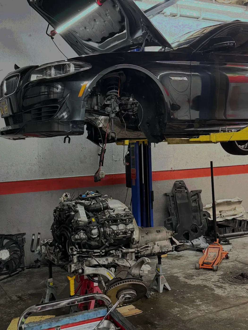 F10 engine out — Drivetrain removed for a major repair on a 5 Series.